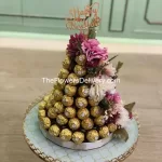 Ferraro Rocher’s Special Tower-Duo of Red Rose and KitKat-Flowers and chocolates bundle- Charming flowers with chocolates- Perfect duo: flowers and chocolates-send love with flowers and chocolates-Floral elegance and chocolates-Flowers and chocolates for delivery-Luxurious flowers and exquisite chocolates-TFD Pakistan-theflowerdelivery.com