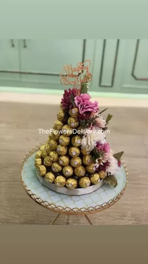 Ferraro Rocher’s Special Tower-Duo of Red Rose and KitKat-Flowers and chocolates bundle- Charming flowers with chocolates- Perfect duo: flowers and chocolates-send love with flowers and chocolates-Floral elegance and chocolates-Flowers and chocolates for delivery-Luxurious flowers and exquisite chocolates-TFD Pakistan-theflowerdelivery.com