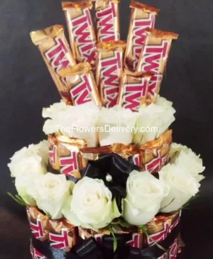 Twix & White Roses Delight-Flowers and chocolate bundle- Charming flowers with chocolates- Perfect duo: flowers and chocolates-Send love with flowers and chocolates-Floral elegance and chocolates-Flowers and chocolates for delivery-Luxurious flowers and exquisite chocolates-Thoughtful flowers and sweet chocolates-Express affection with flowers and chocolates-Blossoms and chocolate gift set- Flowers and chocolates for your loved one-Fresh flowers-Online delivery-Premium basket-TFD Pakistan-theflowerdelivery.com