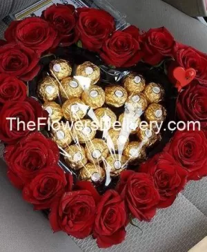 Flavored chocolates-Duo of Red Rose and KitKat-Flowers and chocolates bundle- Charming flowers with chocolates- Perfect duo: flowers and chocolates-send love with flowers and chocolates-Floral elegance and chocolates-Flowers and chocolates for delivery-Luxurious flowers and exquisite chocolates-premium heart box chocos-Heart boc ferro chocolates box-TFD Pakistan-theflowerdelivery.com